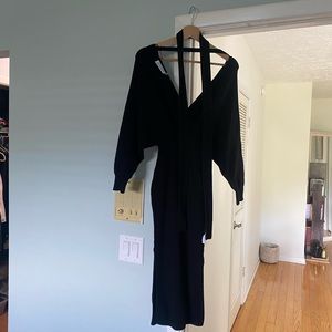 Black off the shoulder body con winter type dress